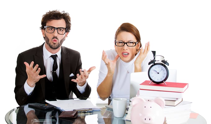 Closeup portrait of attractive couple, handsome man, beautiful woman, looking distressed from financial problems, mounting bills, isolated on white background. Good, bad finance decision. Bank mistake